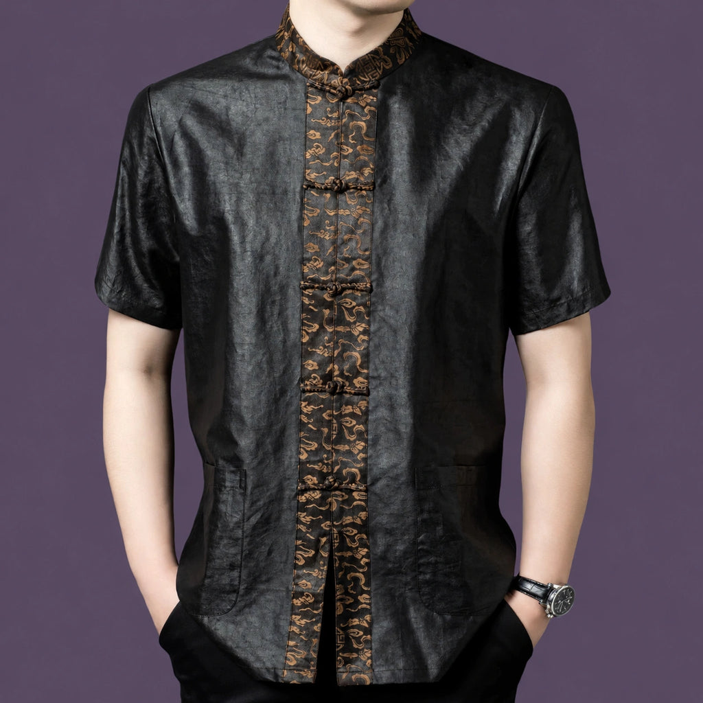 Men's black 100% mulberry silk short-sleeve shirt featuring a contrasting bronze jacquard placket with traditional frog buttons and a stand collar.