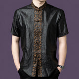 Men's black 100% mulberry silk short-sleeve shirt featuring a contrasting bronze jacquard placket with traditional frog buttons and a stand collar.