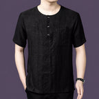 Men's black silk henley with a round neckline and left chest pocket, designed with a simple, breathable silhouette.