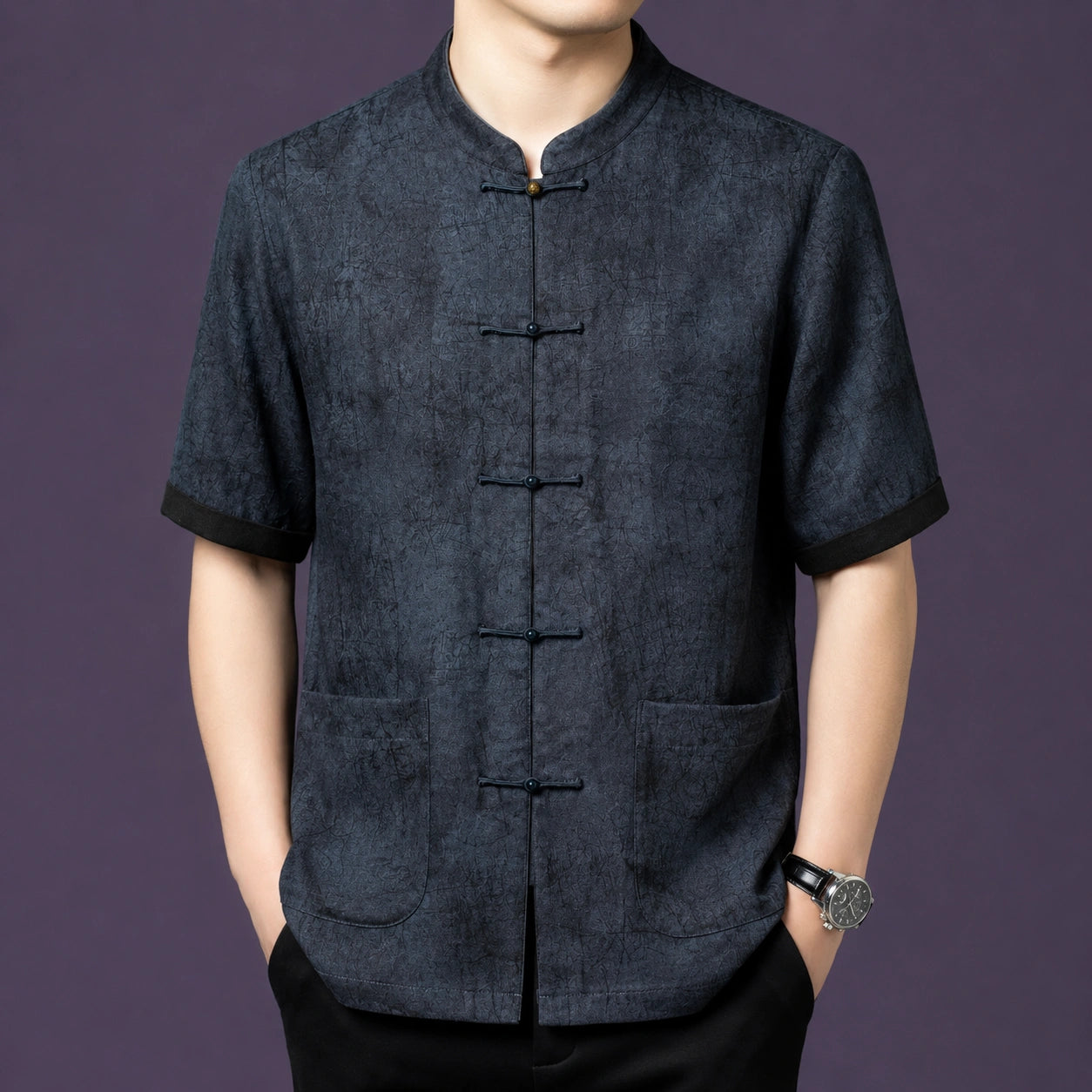 Men's charcoal grey 100% mulberry silk short-sleeve shirt with a stand collar, front patch pockets, and traditional frog button closures.