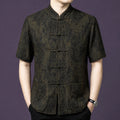 Front view of a man wearing a 100% mulberry silk mandarin collar short sleeve shirt with classic frog buttons.