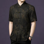 Side angle of a men's 100% mulberry silk mandarin collar shirt featuring an elegant vintage jacquard pattern.