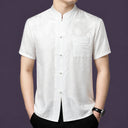 Men's light white/light grey 100% mulberry silk short-sleeve shirt with a relaxed straight cut and a delicate, shimmering floral jacquard pattern.