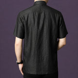 Back view of a men's black 100% mulberry silk mandarin collar short sleeve shirt.