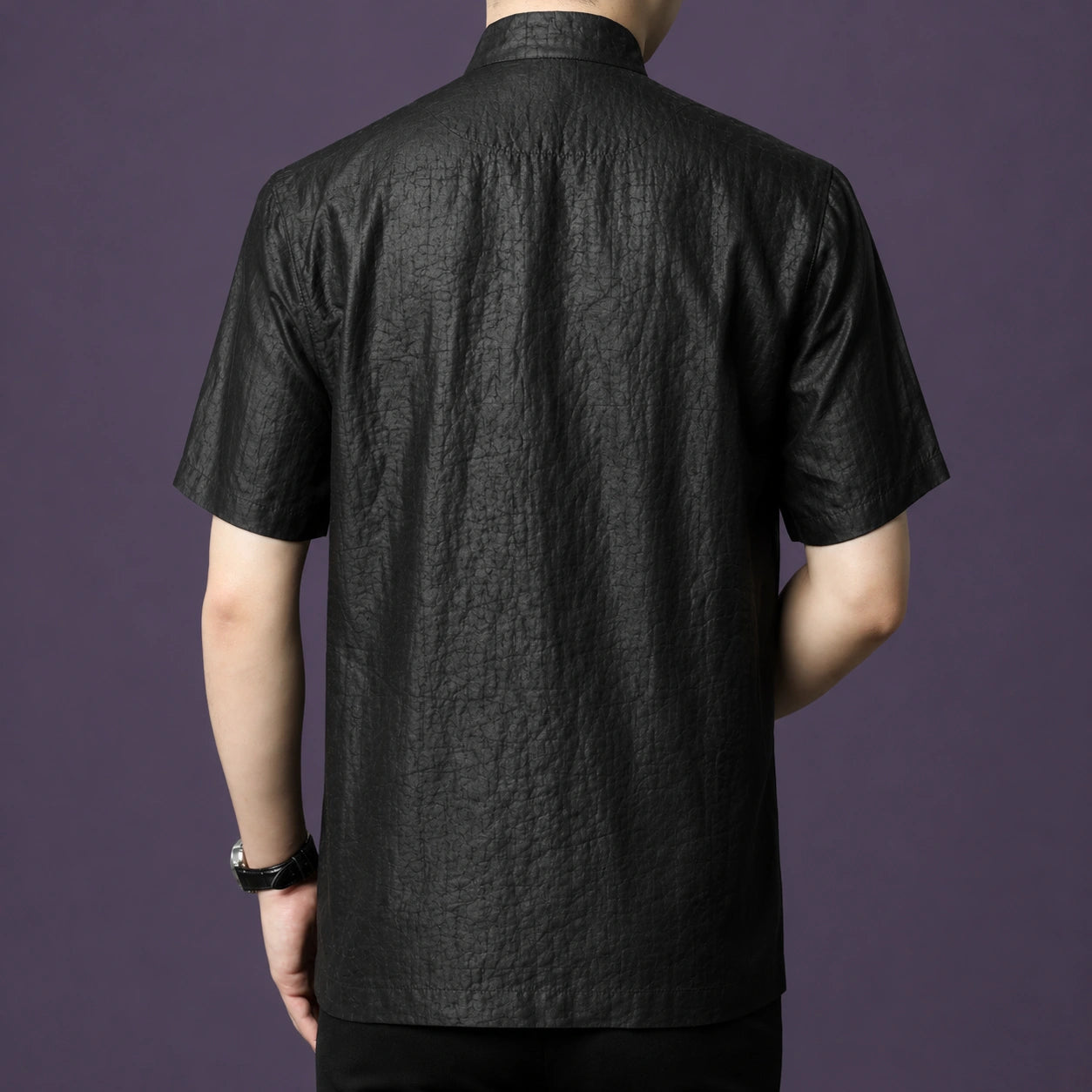 Back view of a men's black 100% mulberry silk Mandarin collar short sleeve shirt.