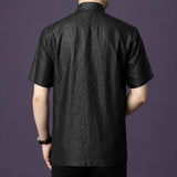 Back view of a men's black 100% mulberry silk Mandarin collar short sleeve shirt.