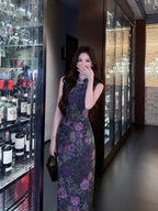 Full-length view of a Midnight Botanical Mulberry Silk floral Cheongsam dress with a Mandarin collar.