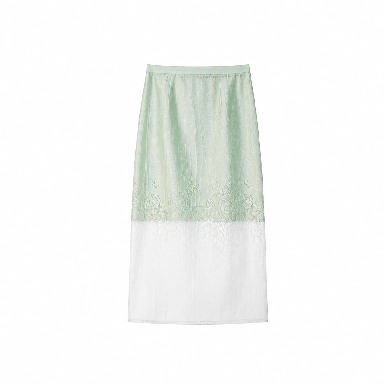 Flat lay of a mint green midi skirt with floral embroidery and a sheer white hem panel, crafted from a Lyocell-polyester blend.