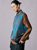 Side view of a mist blue Chinese-inspired Lyocell jacquard vest