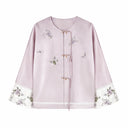 Front view of the misty lavender jacket showing floral embroidery, knot closures and contrast cuffs.