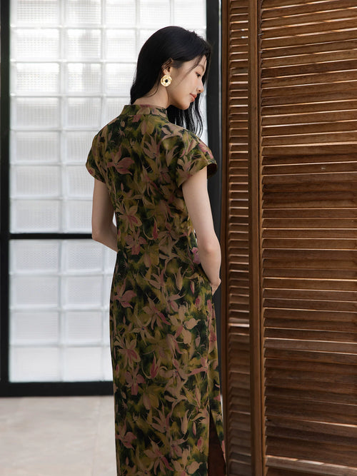 Back view of a 100% mulberry silk botanical print qipao maxi dress.