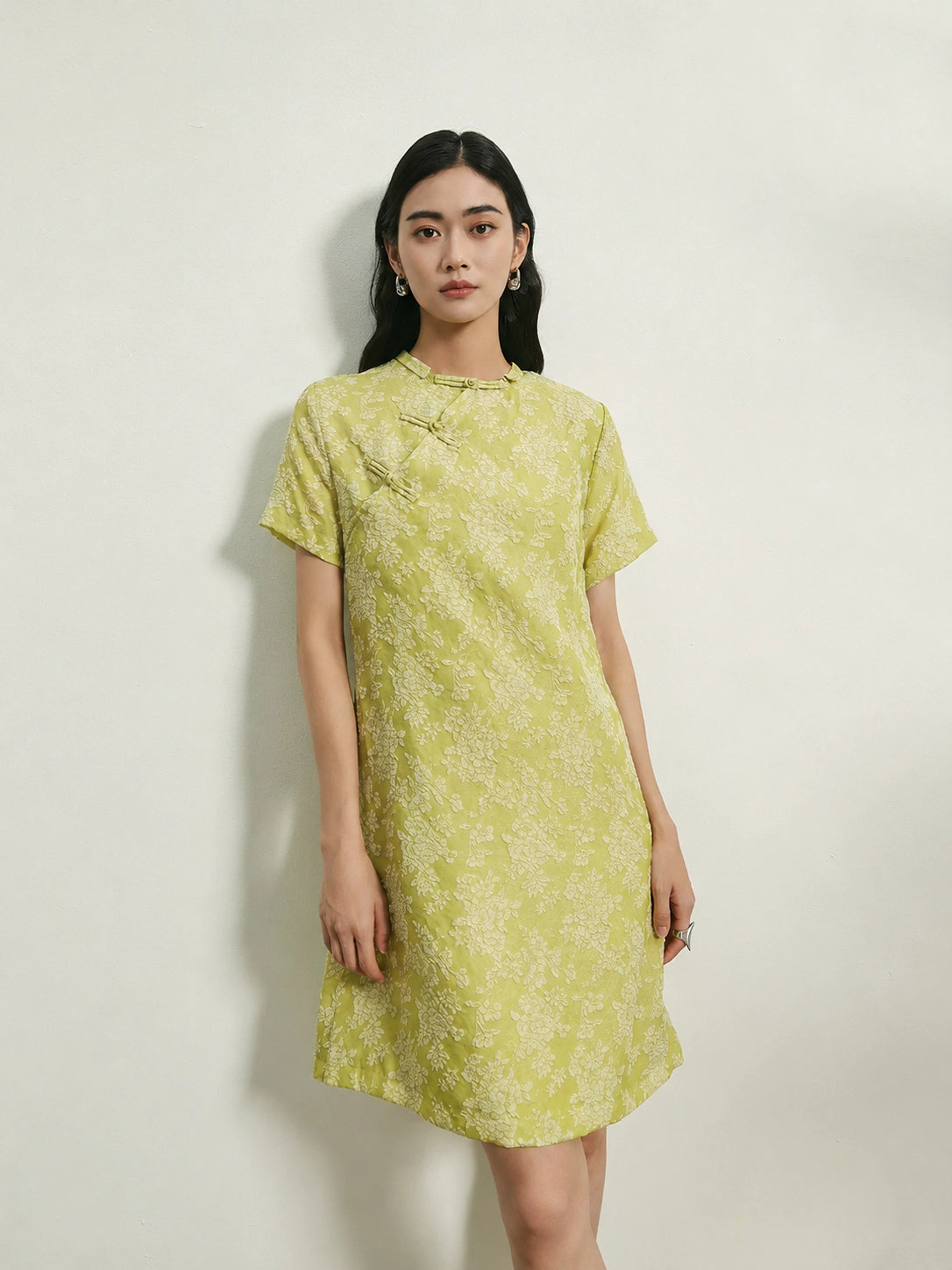 Women's light green 100% mulberry silk floral shift dress with handcrafted frog buttons and round neckline.