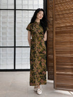 Full-length botanical print mulberry silk qipao dress with elegant straight silhouette.