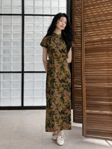 Full-length botanical print mulberry silk qipao dress with elegant straight silhouette.
