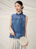 Close-up of the Mulberry Silk Sleeveless Top featuring a mandarin collar and traditional frog closure.