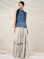 Full-length styling of the Mulberry Silk Sleeveless Top paired with hand-dyed wide-leg trousers.