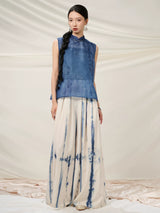 Full-length styling of the Mulberry Silk Sleeveless Top paired with hand-dyed wide-leg trousers.