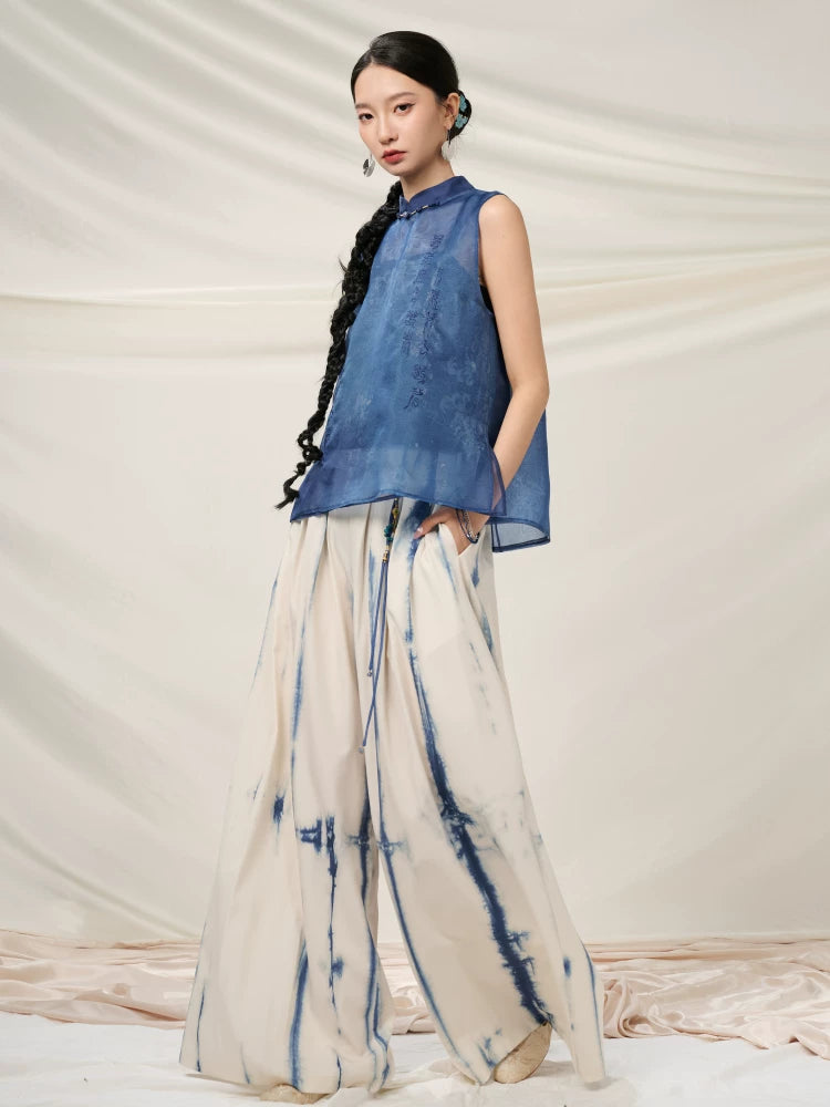 Side view of the Mulberry Silk Mandarin Collar Sleeveless Top with a relaxed flowing silhouette.
