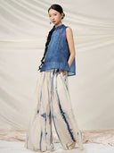 Side view of the Mulberry Silk Mandarin Collar Sleeveless Top with a relaxed flowing silhouette.