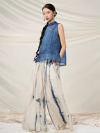 Side view of the Mulberry Silk Mandarin Collar Sleeveless Top with a relaxed flowing silhouette.