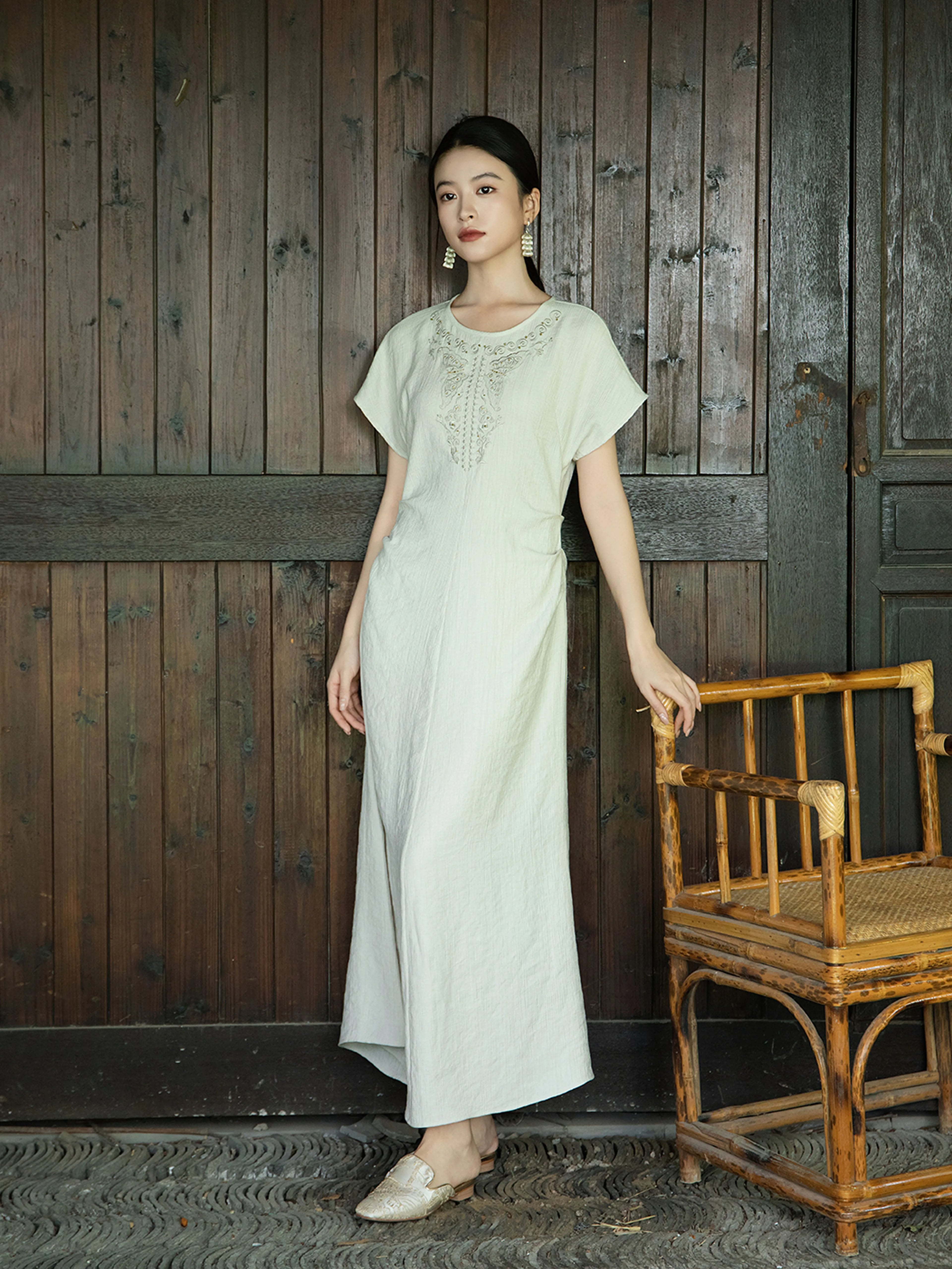 Full length embroidered summer maxi dress with relaxed silhouette in light sage green by Gambiered Silk