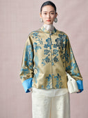 Front view of a women’s silk-blend jacquard jacket with a Mandarin collar and blue buttons