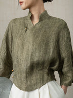 Close-up of the Olive Green Linen Mandarin Collar Blouse showing the premium linen texture.