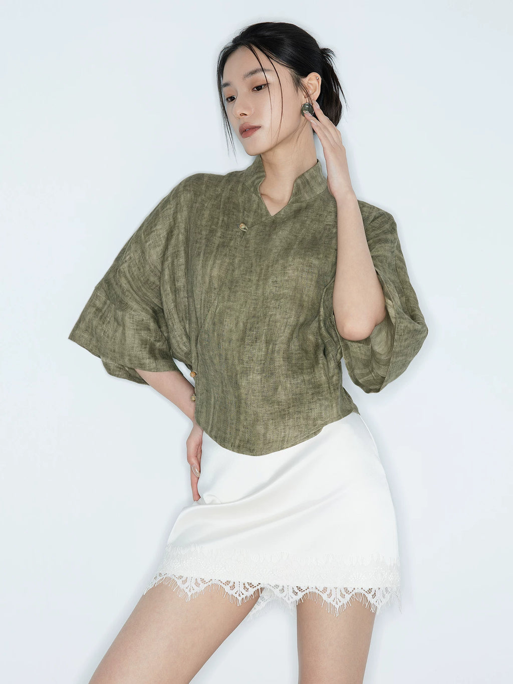 Relaxed fit Olive Green Linen Mandarin Collar Blouse in a modern oriental style.