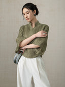 Side view of the Olive Green Linen Mandarin Collar Blouse in premium linen.