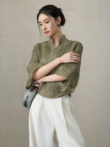 Side view of the Olive Green Linen Mandarin Collar Blouse in premium linen.
