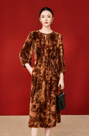 Front view of the copper-orange dress with a self-tie waist