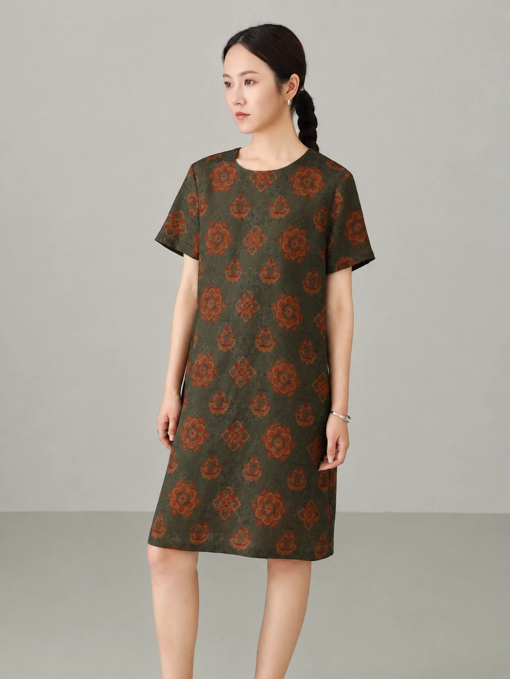 Women's oriental floral Xiangyunsha silk dress crafted from 100% natural mulberry silk with elegant summer silhouette.