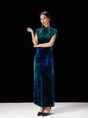 Elegant peacock teal silk blend qipao dress featuring a modern Chinese-inspired silhouette.