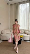 Front view of a blush pink Qipao dress with a mandarin collar and side slits, showcasing the breathable linen blend fabric.