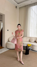 Full body shot of a soft pink midi Qipao dress with cap sleeves and a relaxed silhouette, ideal for elegant daily wear.