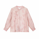 Flat lay of a pink long-sleeve Cheongsam blouse with a mandarin collar, floral embroidery, and sequin details, crafted from 100% polyamide.