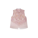 Flat lay of a pink sleeveless vest with gold metallic buttons, lace trim, and a layered sheer hem, crafted from a Lyocell-metallic blend.