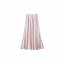 Flat lay of a pink satin A-line maxi skirt with a high waist and smooth flowing drape, crafted from 100% polyester.
