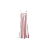 Flat lay of a soft pink satin slip dress with thin straps and a relaxed fit, ideal for layering, made from 100% polyester.