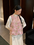 Front view of the pink Song brocade silk vest with jade rabbit and lotus-inspired gold-thread patterns