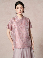 Front view of a purple silk top featuring a traditional stand collar and a delicate side frog button detail, highlighting the subtle sheen of the fabric.