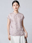 Model wearing a light purple 94% mulberry silk top with a stand collar, asymmetrical button placket, and butterfly jacquard pattern, paired with a white skirt.