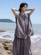 Relaxed ramie lyocell matching set with a gathered sleeveless top and flowing maxi skirt.