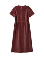 Back product view of the relaxed red silk midi dress with a keyhole neckline and slender belt