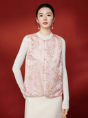 Front styling view of the blush pink side with floral pattern and button closure