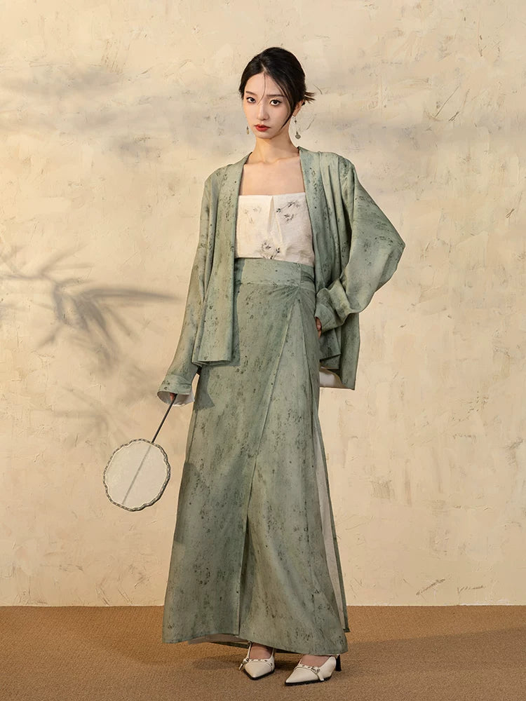 Front view of the Sage Green Draped Sleeve Jacket and Wrap Skirt Set.