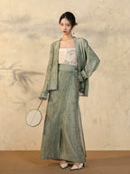 Front view of the Sage Green Draped Sleeve Jacket and Wrap Skirt Set.