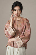 Model showing the jacket’s contrasting embroidered cuffs