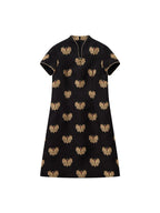 Front product view of the black mulberry silk Song brocade dress with woven gold butterflies