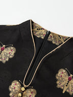 Close-up of the V-notch stand collar, gold piping, concealed zipper and butterfly jacquard